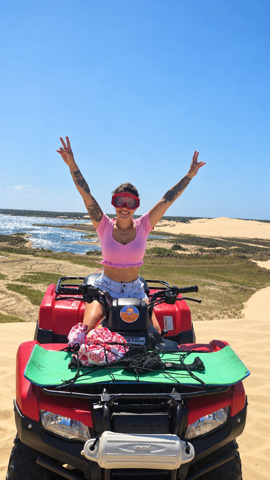 A guest enjoying a quad outing in the coastal dunes